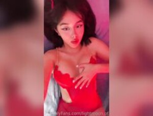 Xlightmoonx In a Sexy Red Outfit With Horns
