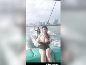 Busty Asian on Boat