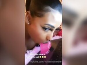 HabeshaBarbie sucking a dildo