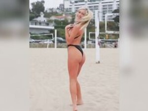 Hannah Palmer black swimsuit