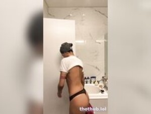 Mia K titties exposed at home