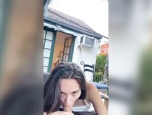 Amy blowjob in garden