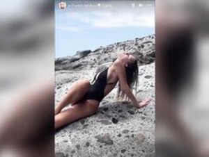 Polina Malinovskaya posing in bikini