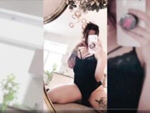Jodie Calussi infront of mirror