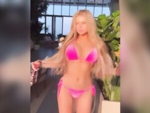 Zolotova in pink bikini