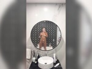 Dee Nguyen playing in shower