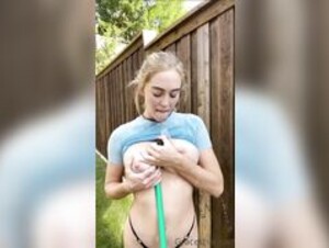 Gracecharisxo getting wet in the garden