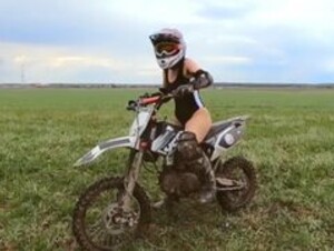 A Naked Girl On A Dirt Bike