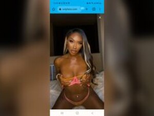 Kithebody stripping on bed