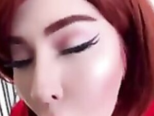 ElasticMilf blows BBC dildo