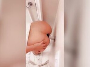 TheRealBrittFit Fucks Wall Dildo in Bathroom