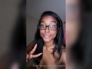 Lewddreams0 showing off glasses with right boob out teasing