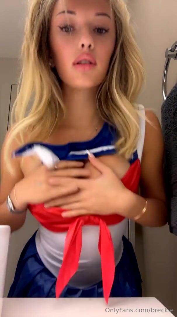 Breckie Hill Has Her Arm On Her Boobs