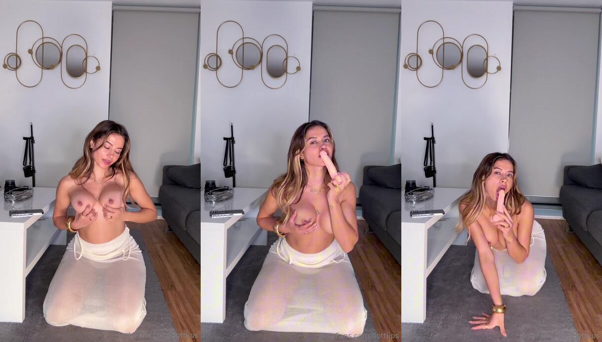 Hottlips Sucks A Dildo With Her Tits Out